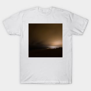 Beach of Carnon with an Illuminated Cloud Cover at Night T-Shirt